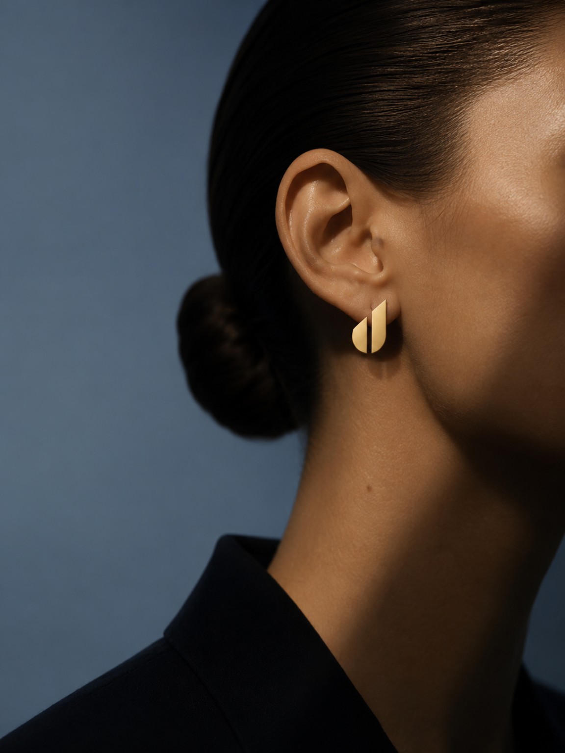 JUNO divided J symbol as a gold earring